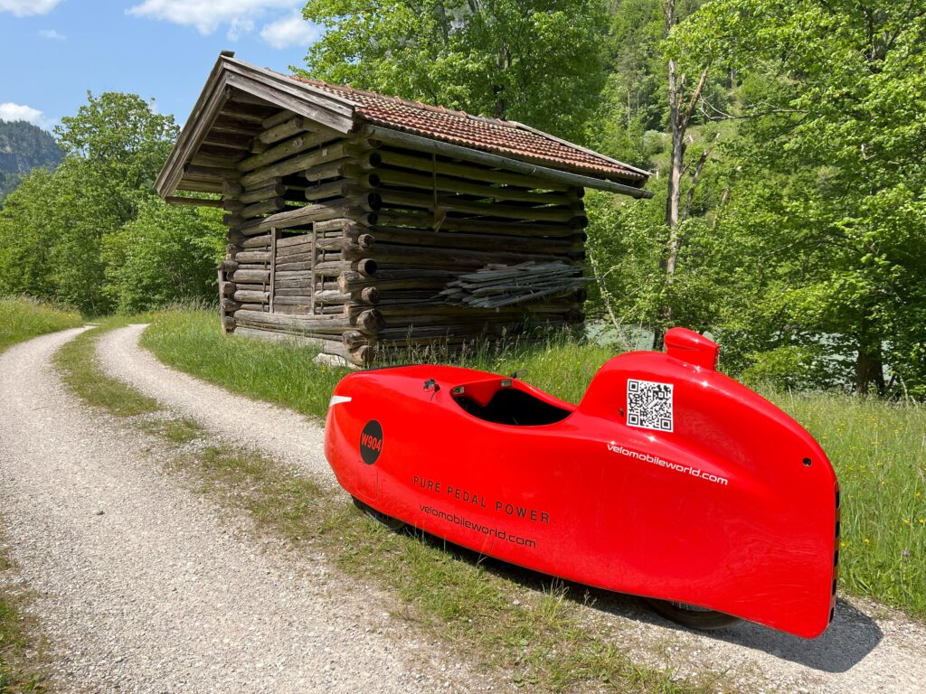 W9 velomobile near shed in Austria